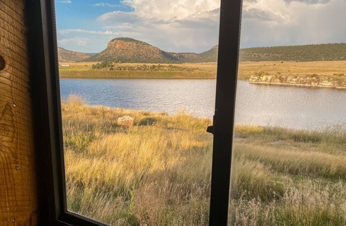 Rainsville Cabin | Rustic 4 bedroom cabin with pond on scenic ranch