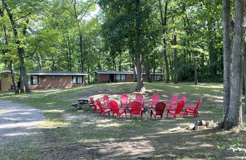 Palmyra Cabin | Rustic cabins in secluded campground with lake access and woods to wander in.