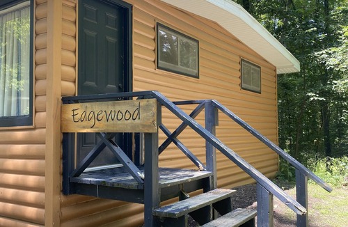 Palmyra Cabin | Rustic cabins in secluded campground with lake access and woods to wander in.