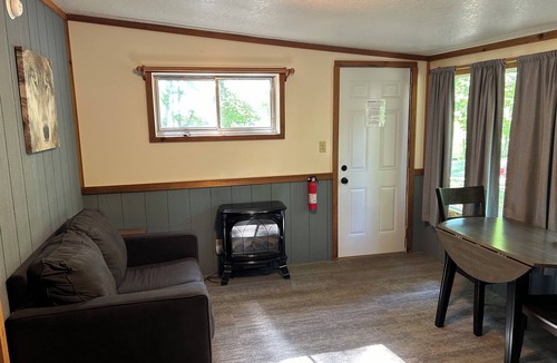 Palmyra Cabin | Rustic cabins in secluded campground with lake access and woods to wander in.