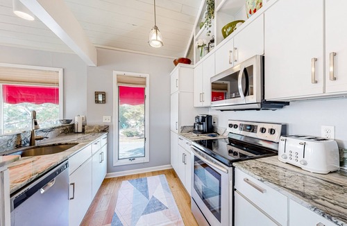 Sandpiper Pines House | Sandpiper Village home with private beach, fireplace, balcony, & washer/dryer