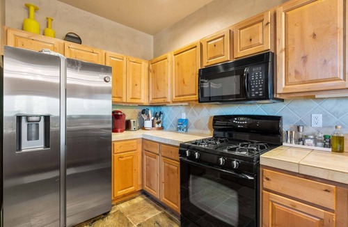 Santa Fe House | Santa Fe 119 | Kiva Fireplace | Office | Vaulted Ceilings