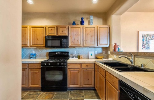 Santa Fe House | Santa Fe 119 | Kiva Fireplace | Office | Vaulted Ceilings