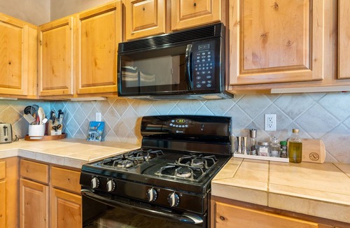 Santa Fe House | Santa Fe 119 | Kiva Fireplace | Office | Vaulted Ceilings