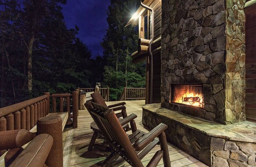 Almond Cabin | Secluded log cabin with fireplace and hot tub on deck.