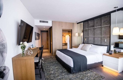 Logan Square Hotel | Skyline Pool Access with Skydeck + Fitness Room