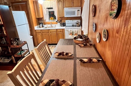 Peace Dale Cabin | Small cozy cabin with grill & fire pit close to beaches, skiing, biking and URI.