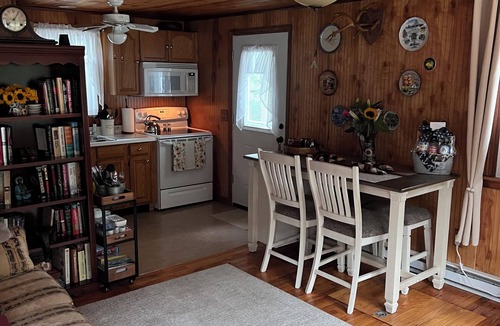 Peace Dale Cabin | Small cozy cabin with grill & fire pit close to beaches, skiing, biking and URI.