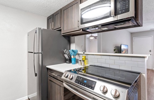 Dawson Apartment | Soco 2BR Corner Suite w Pool King bed Fast Wifi
