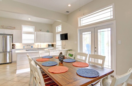 Sand Point House | Southern Comfort-in town, steps from heated pool, hot tub, beach boardwalk