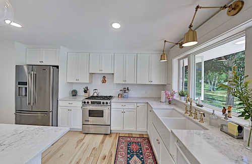 Newcastle House | Spacious lakefront home on lush 5-acre lot with sunny deck & private dock