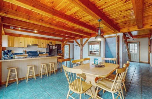 Greenville Junction House | Spectacular lakefront home with dock, firepit, & vaulted ceilings - dog-friendly