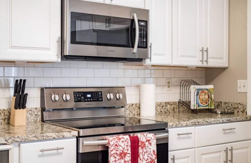 Olde Towne East House | Stately Executive Home with Modern Amenities