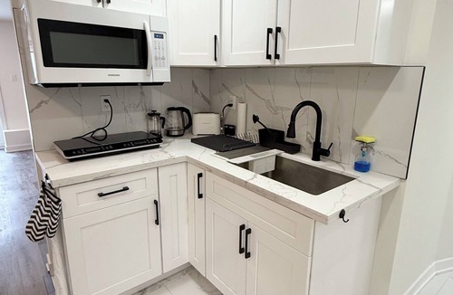 Ottawa Division Condo | Studio condo separate unit with full access to the backyard