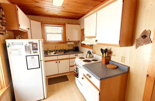 Greenville Cabin | Stunning Waterfront Cabin with Fire Pit, Porch and Deck in Maine