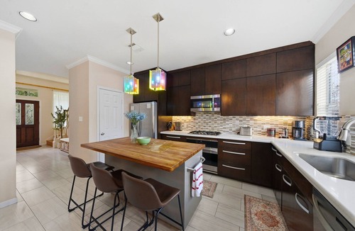 Midtown House | Sun-Drenched 4BR Midtown Oasis, Private Parking