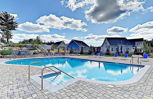 Arundel Cottage | Sunkissed cottage, heated pools, club house, game room, 15 mins to local beaches