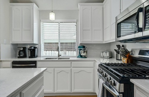 Wells Branch House | Sunny Haven: Open Concept Living, Games Galore by Hello Hideout