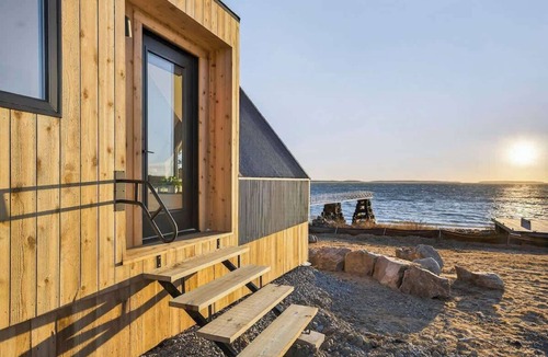 Bernard Cabin | Sunset Oceanfront Cabin with Beach, Dock and Sauna