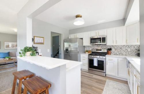 Parma House | Swim and Relax with a Pool Hot Tub and Renovated HomeHop