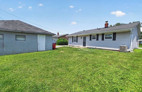 Grove City House | The Birdhouse - Mid-Century Charm with a Speakeasy Lounge