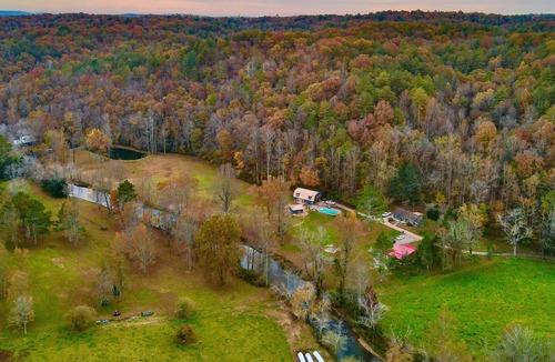 Ellijay Cabin | Three wonderful cabins on the river with pool, hot tub, fishings, & waterfall