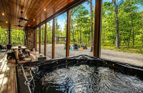 Hochatown Cabin | Timberline Retreat with Games, Fireplaces, Hot tub, Playground Set, No Pets