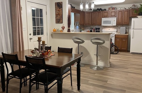 Coffeyville House | Trendy home with a scenic back porch, fish, golf pickle ball and more