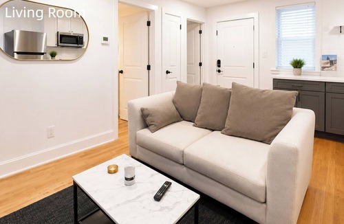 Corn Hill House | Unwind in this well-maintained unit with free parking, a fully stocked kitchen, and an in-suite washer/dryer. Perfect for work or leisure travel, this comfortable space has everything you need for a relaxing stay.