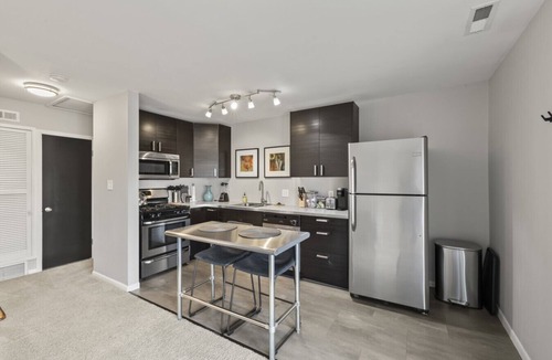 Grandview Heights Apartment | Updated flat with parking and laundry in an exceptional location