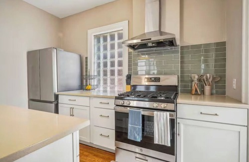 Olde Towne East House | Updated Historical Home Downtown - Sunroom & Yard! Perfect for Families & Groups