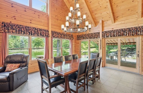 Perinton Cabin | Upscale log cabin w/20` ceilings, indoor hot tub & King beds