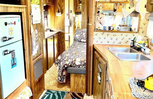 Farmersville Station House | Vintage camper with fabulous views of the rolling hills of Western New York