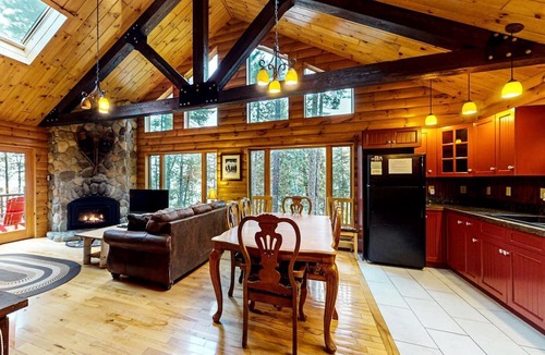 Greenville Cabin | Waterfront Cabin with Private Deck Loaded with Kayaks in Maine