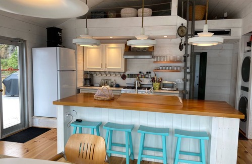 Georgetown Cottage | Waterfront, west facing, modernized fisherman’s cottage perched on the water.