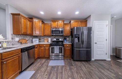 Fayetteville House | Welcome to The Coves Getaway — a peaceful, family-friendly 4-bedroom home.