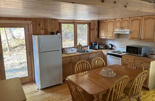 Otis Cabin | Welcoming 4-bedroom lake front cabin in charming Otis on Beech Hill Pond.