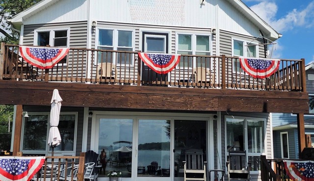 Bemus Point lakefront family home with deck, dock, boat slip, sunroom with view