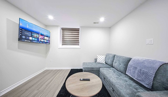 Bright Basement Suite w Parking near McLennan Park
