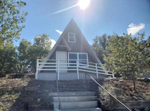 Charming Lakeside Cabin with Fire Pit & Private Dock Near Lake Cisco, Cisco, TX