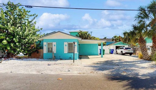 Colorful beach cottage w heated private pool & grill area - dog-friendly
