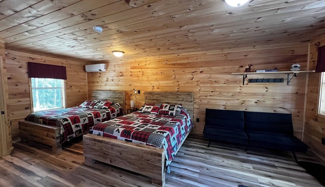 Cozy cabin rental located on the atv & snowmobile trail. Family & Pet friendly