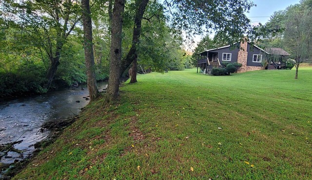 Creekside cascades is a beautiful 3 bedroom waterfront cabin on 2 acres!