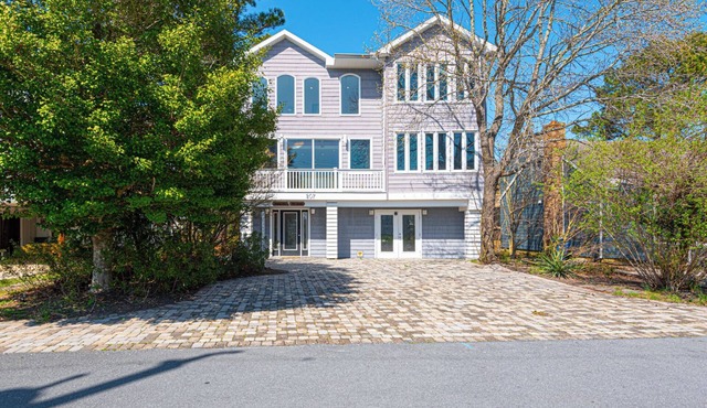 Dockside Daydream - Beautiful 4 Bed, 3.5 Bath South Bethany Beach Home with elevator only 1/2 mile walk to the beach with canal access and views