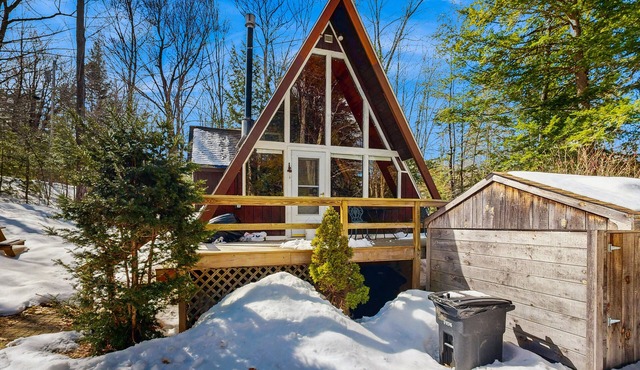 Dog-friendly A-frame with firepit, fireplace, AC, & kayaks - walk to the beach