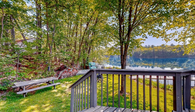 Dog-friendly pond-front cottage with deck, grill, firepit, water view, fast WiFi