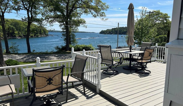 Enjoy spectacular views of Lobster Cove. Large yard, EV charger & dog friendly.