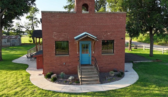 Experience a cozy, curated stay in our beautifully restored 5BR Schoolhouse and a hydrotherapy massaging hot tub.