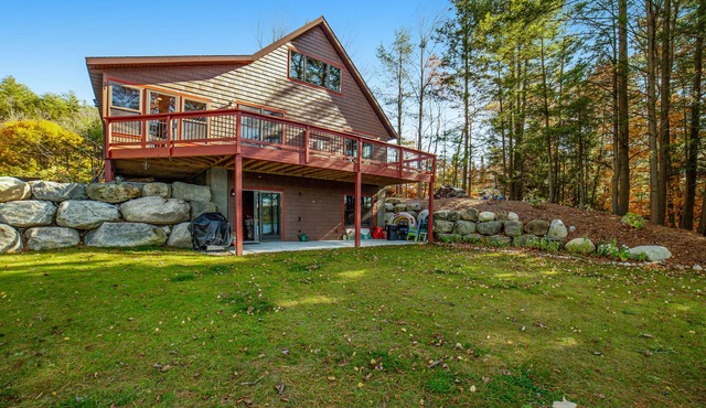 Gorgeous Lakefront Home with a Fire Pit, Two Living Areas, and a Sunroom