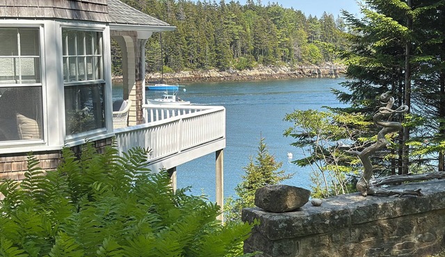 Historic Summer Cottage with stunning views of the harbor and modern amenities.